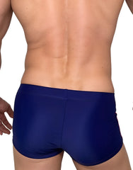 Navy blue wildmant monster cock swim square cut trunks with smooth form fitting fabric and minimalist design