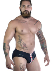 WildmanT sportivo bikini black swim trunks with red and white side stripes and wildman logo on left leg