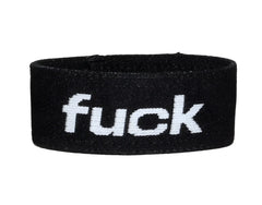 Black elastic wristband with white embroidered fuck text from wildmant verbal max cock-ring fuck product