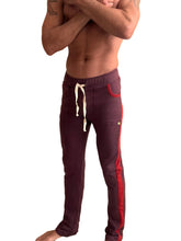 Winter collection mid-weight luxury-fleece burgundy track pants with red side stripes and cream drawstring