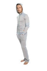Light gray mid-weight fleece zip-up hoodie with green trim and matching pants from winter collection for yoga and casual wear