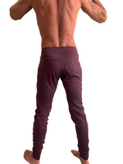 A pair of deep burgundy winter edition luxury fleece jogger and yoga sweat pants with high waistband and side seam detailing