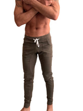 Olive green slim-fit winter edition luxury fleece jogger pants with white drawstring and side pockets for yoga and casual wear