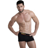 Black wo underwear solid boxer briefs in size m featuring a gold wo logo on the waistband
