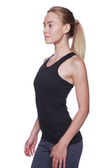 Woman wearing a black racerback tank top with smooth form fitting design paired with charcoal 3/4 cuffed capri yoga pants