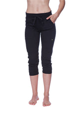 Women’s solid black capri yoga pant with cuffed hem drawstring waistband and side pockets in jogger style