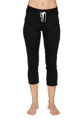 Women’s black 4/5 length capri yoga pants with white drawstring waistband and zipper pockets for athletic use