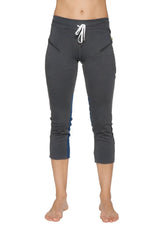 Women’s charcoal capri yoga pants with blue side panels, white drawstring waistband, and zipper pockets