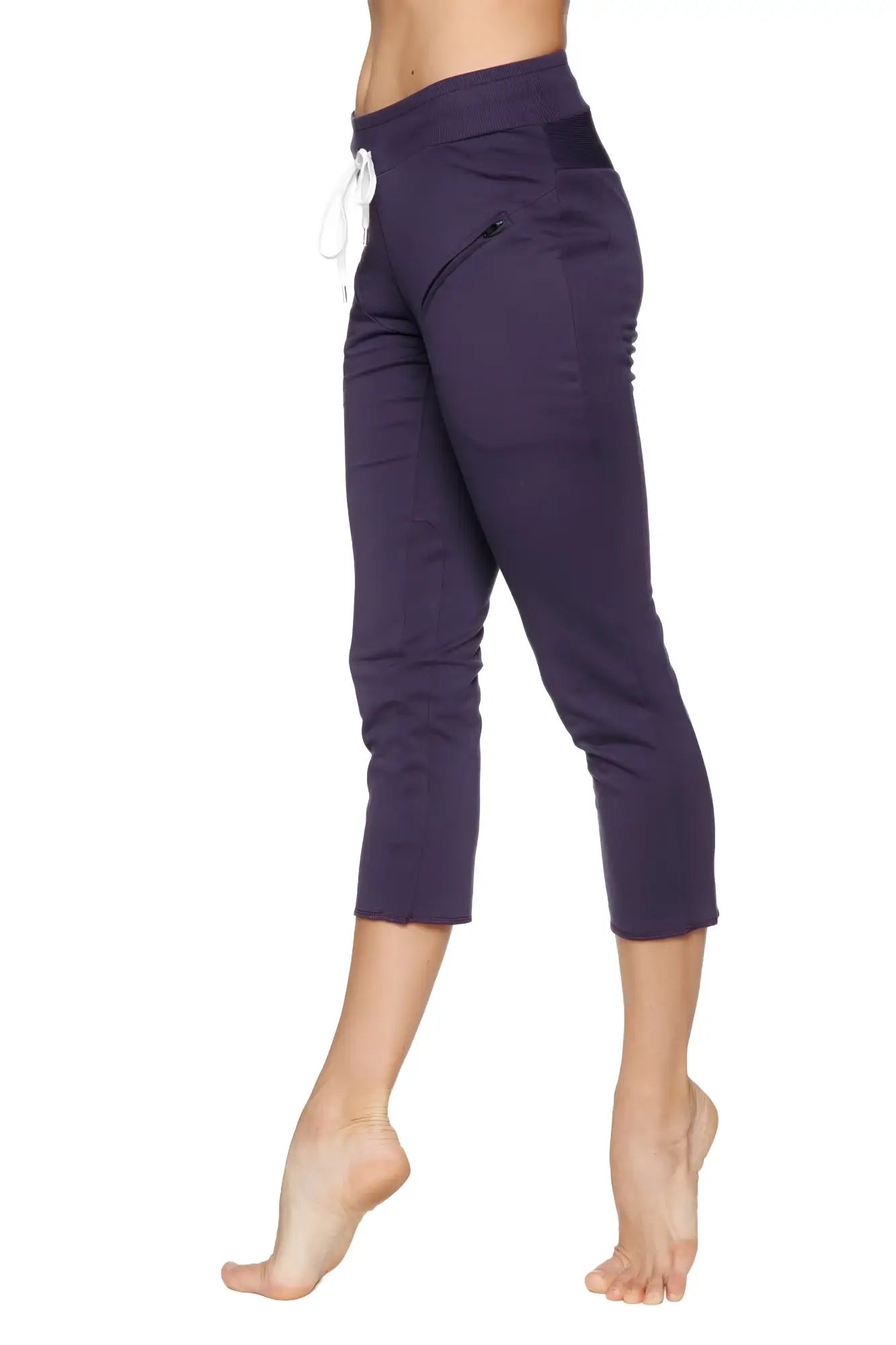 Women’s navy blue high-waisted 4/5 length zipper pocket capri yoga pants with white drawstring and side pockets