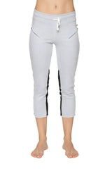 Women’s grey capri-length zipper pocket yoga pants with black side stripes and white drawstring waistband