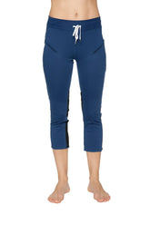 Women’s royal blue 4/5 length zipper pocket capri yoga pants with black side panels and white drawstring waistband