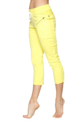 Bright yellow women’s 4/5 length zipper pocket capri yoga pants with high waist and white drawstring in tropic yellow
