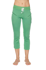 Women’s bamboo green capri yoga pant with 4/5 length, zipper pocket, white drawstring waistband, and side pockets