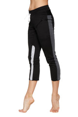 Women’s black capri yoga pants with charcoal and grey side stripes and a drawstring waistband