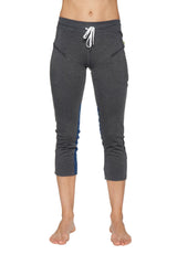 Women’s charcoal capri yoga pants with blue side panels, white drawstring waistband, and zipper pockets