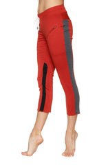 Women’s 4/5 length cinnabar capri yoga pants with gray black side stripe and white drawstring waistband