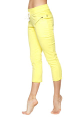Bright yellow women’s 4/5 length zipper pocket capri yoga pants with high waist and white drawstring in tropic yellow