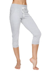 Light gray cuffed capri-length jogger yoga pants with drawstring waistband and side pockets for women