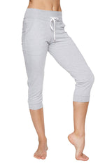 Light gray cuffed capri-length jogger yoga pants with drawstring waistband and side pockets for women
