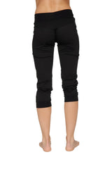 Women’s cuffed jogger yoga pant in solid black with soft stretchy fabric and elastic waistband in capri length
