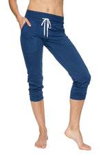 Women’s cuffed jogger yoga pant in solid royal blue with white drawstring waistband and side pockets