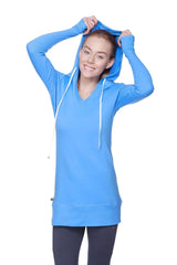 A vibrant ice blue women’s long body hoodie top with a v-neck, royal blue sleeves, and white drawstrings