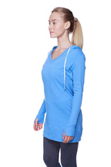 A vibrant ice blue women’s long body hoodie top with royal blue v-neck and white drawstrings long sleeves