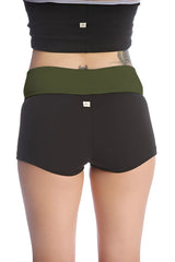 Womens yoga transition short in black with olive green waistband made of soft stretchy fabric with subtle branding