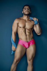 Vibrant fuchsia xtremen 91234 microfiber trunks with sleek satin briefs and black brand tag at the waistband