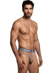 Beige microfiber bikini brief with a grey Xtremen branded elastic waistband.