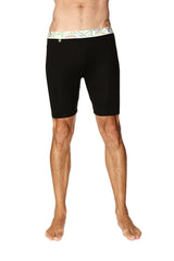 Black yoga compression shorts with colorful geometric patterned waistband designed for men’s cycling and fitness