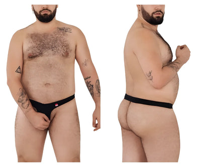 A muscular man models black ball-lifting underwear against a white background.