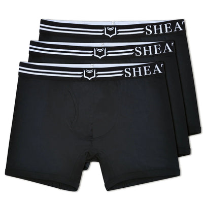 Three pairs of black boxer briefs with striped elastic waistbands on white.