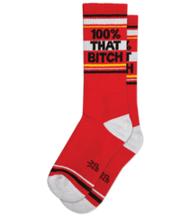 Red crew socks with white and black stripes featuring bold text 100% that bitch across the top section