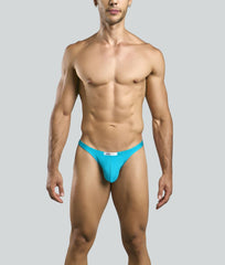 Bright turquoise justin and simon classic tanga athletic briefs with sleek form-fitting design and white waistband tag
