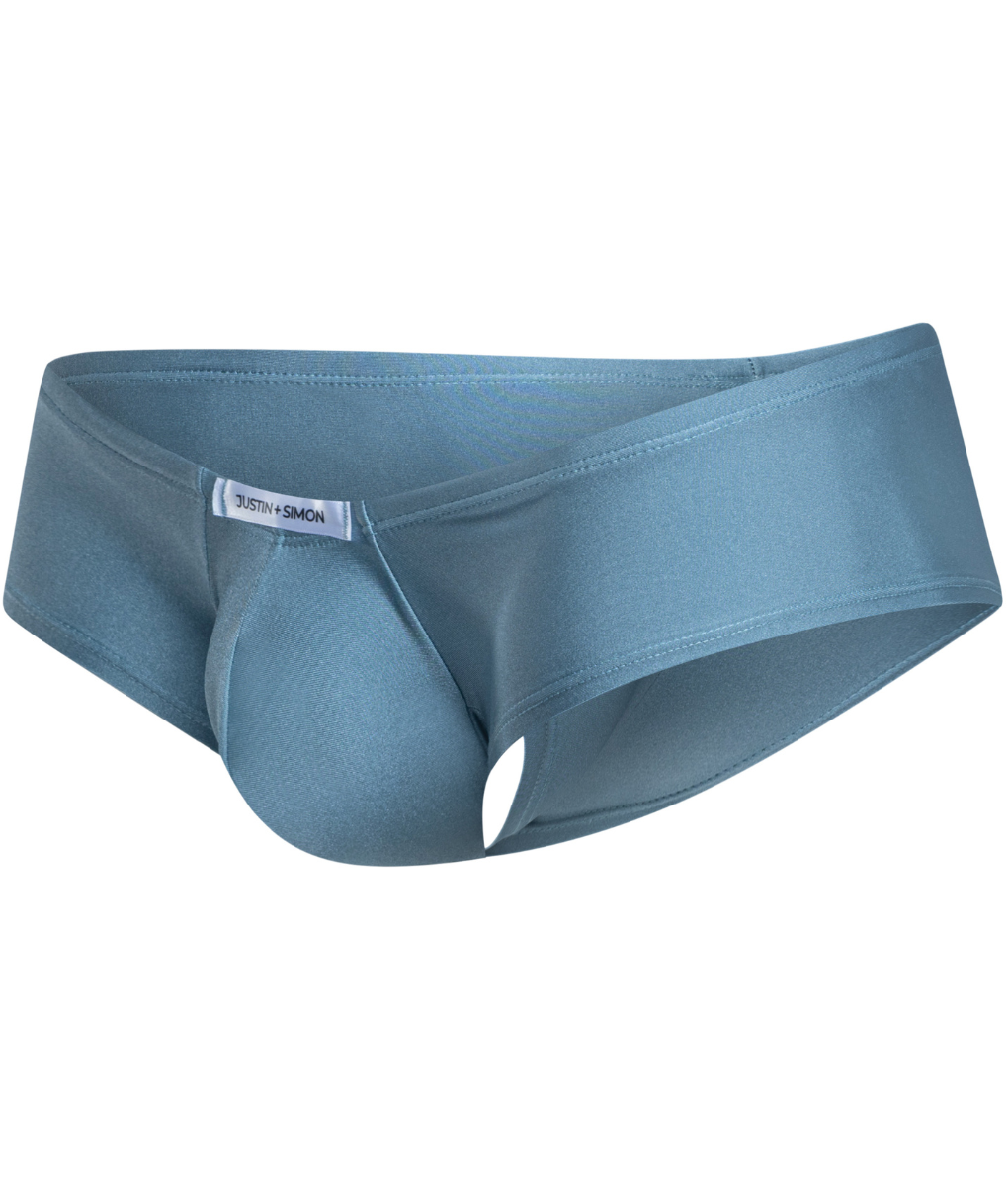 A sleek solid blue men’s brief with smooth fabric and a subtle brand tag from Justin + Simon cheeky bulge boxer