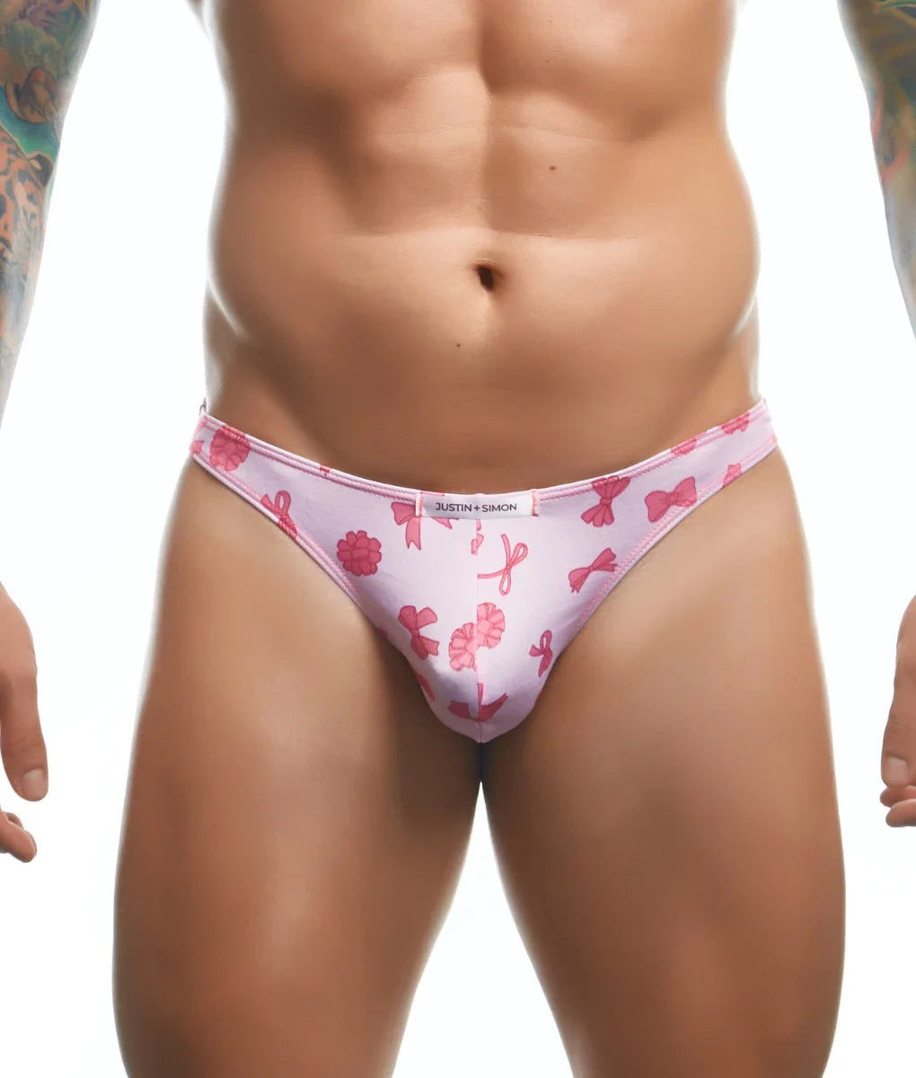 Pink patterned classic tanga thong with bow and ribbon designs and white justin simon waistband by justin simon