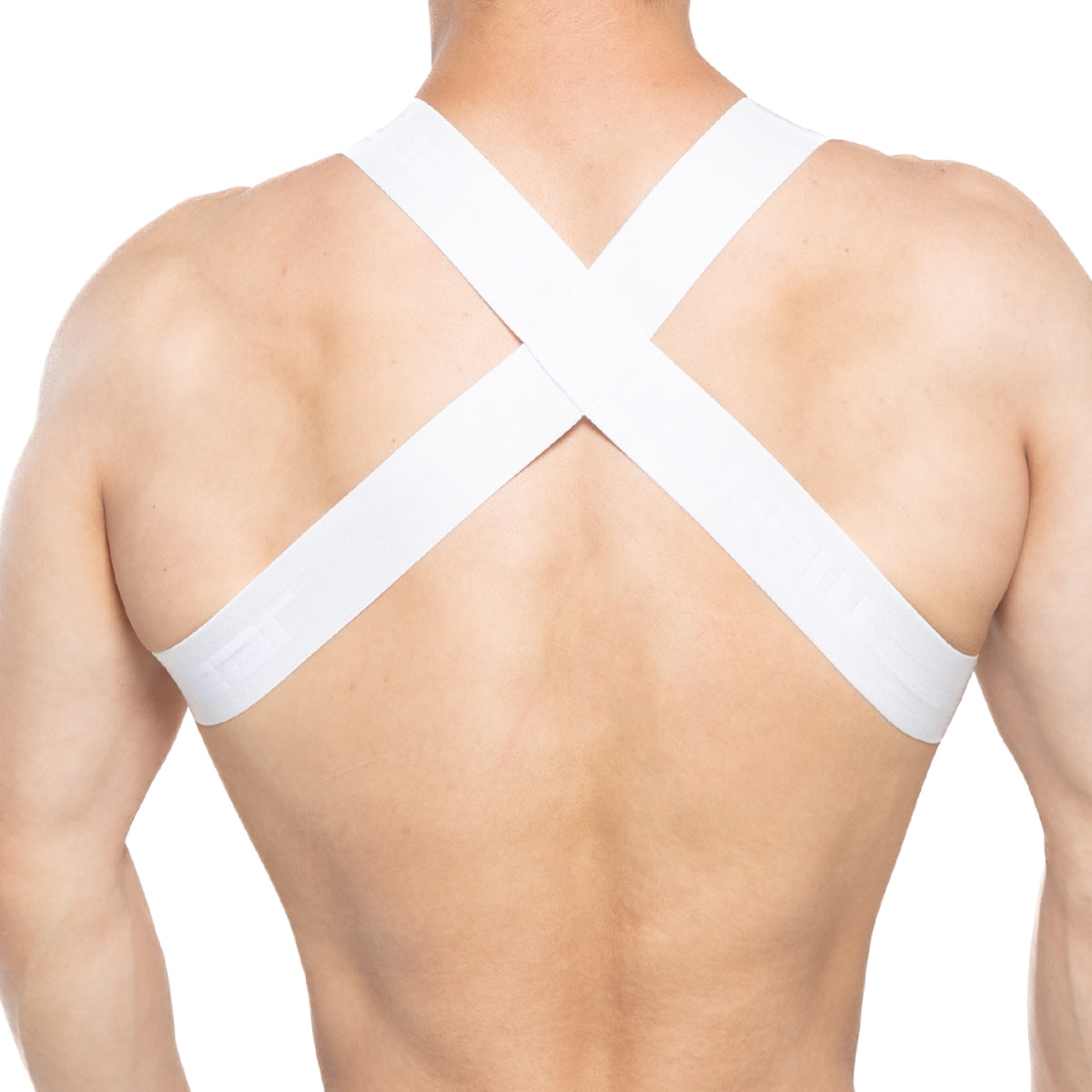 White cross-back support strap harness worn over shoulders shown from the back metroMaleWear brutal harness white