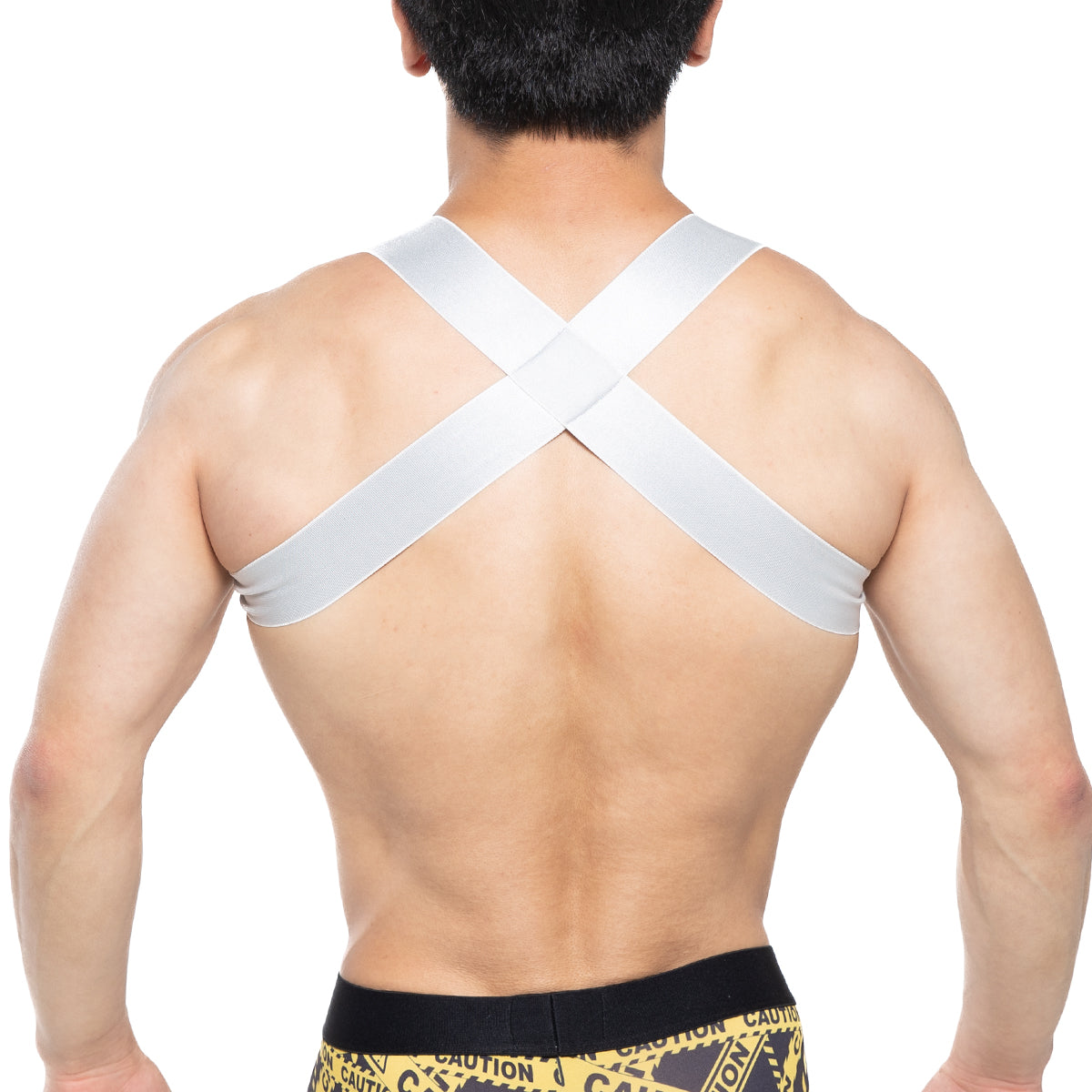 White cross-back support strap of metromalewear steel harness 1400-10 showing back side design