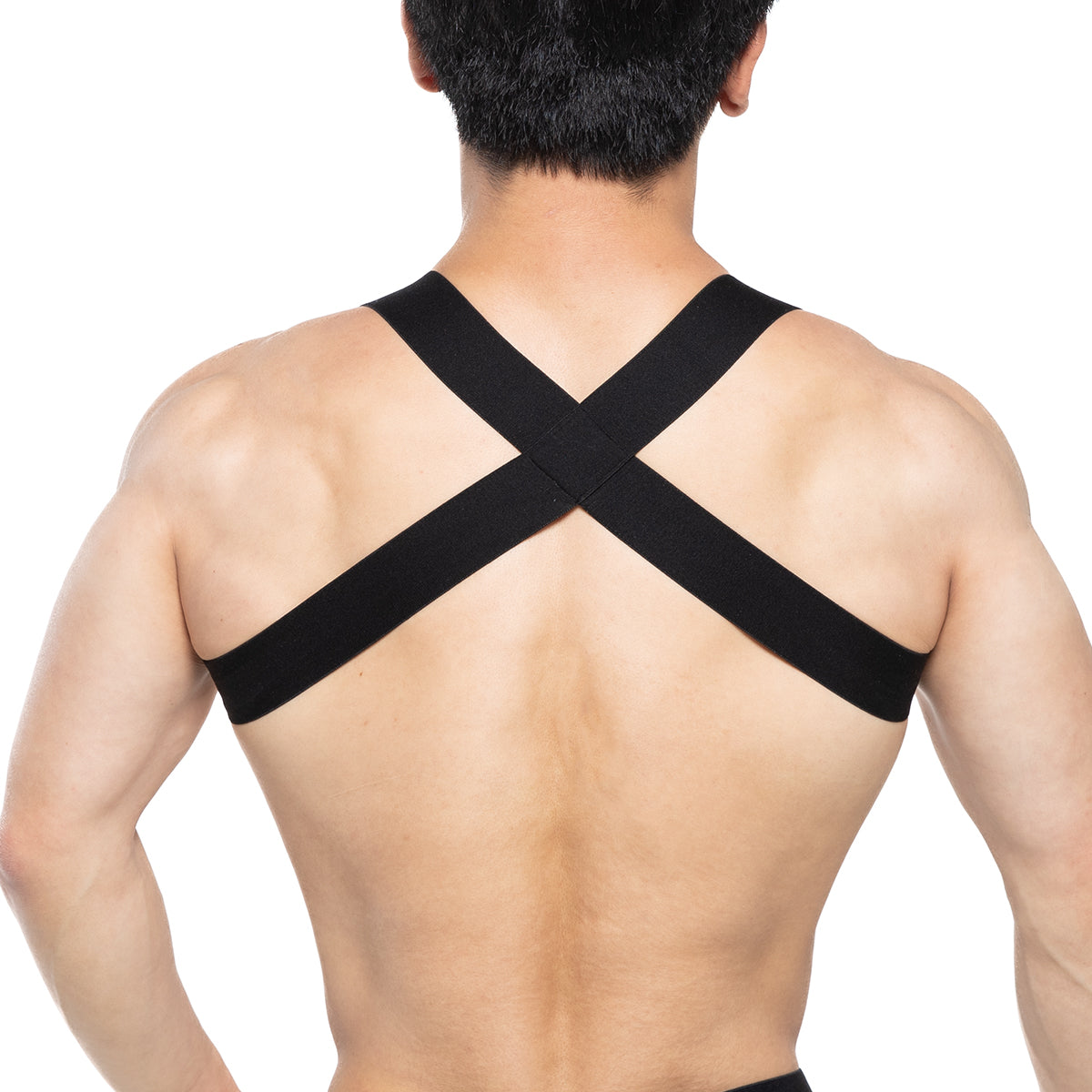 Black elastic cross-back support strap of metromalewear sergant harness 1400-61 shown from the back side