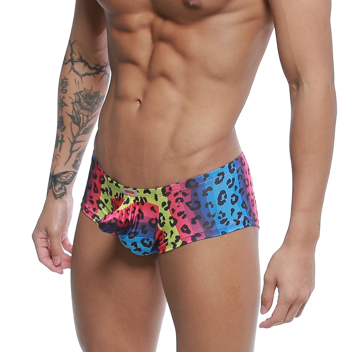 Metro male wear cannon boxer neon swim trunks with vibrant multicolored leopard-print and pink blue yellow gradient design