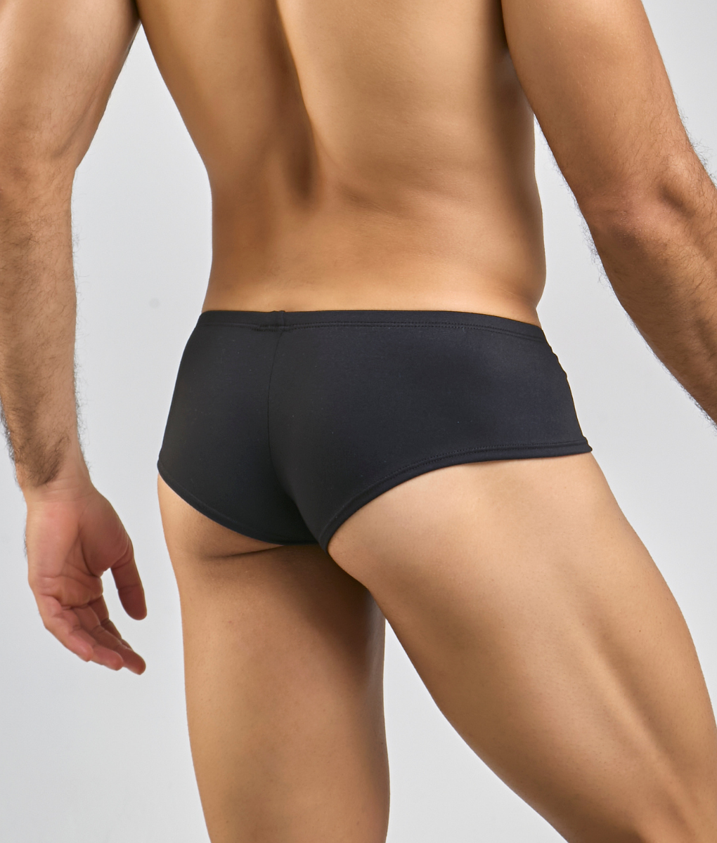 Black justin + simon cheeky bulge boxer briefs with a smooth, form-fitting design in peach color