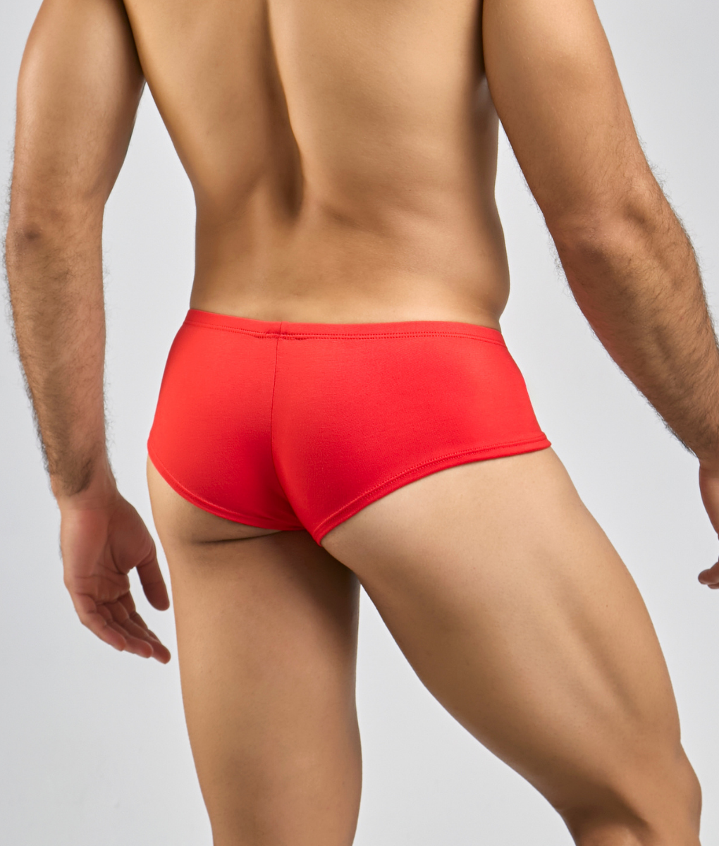 Justin plus Simon cheeky bulge boxer peach in bright red form-fitting swim trunks with smooth elastic waistband
