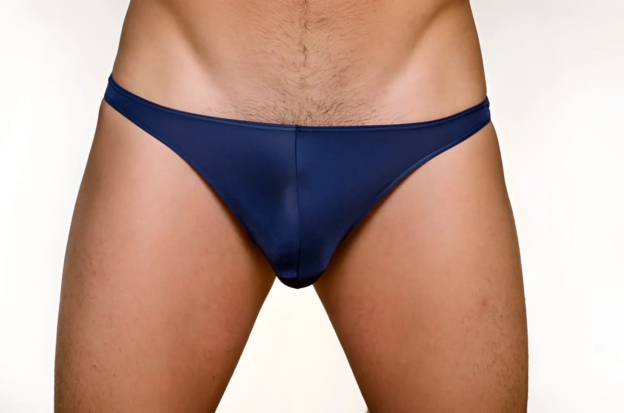 Navy blue sheer mesh briefs shown from the back in a 3 pack pride metro thong set featuring lightweight material
