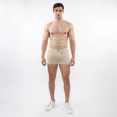 Beige 3 inch stretch knit chino shorts with classic button closure and tailored fit for comfortable wear