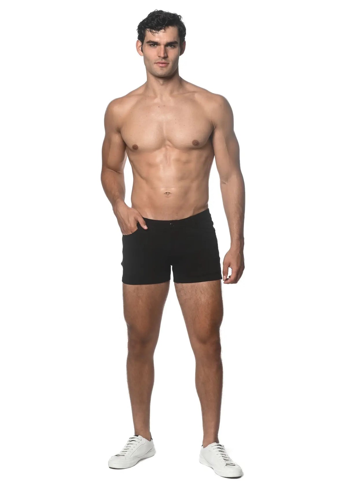 Black 3 inch stretch knit athletic shorts made of flexible fabric worn by a model for activewear use