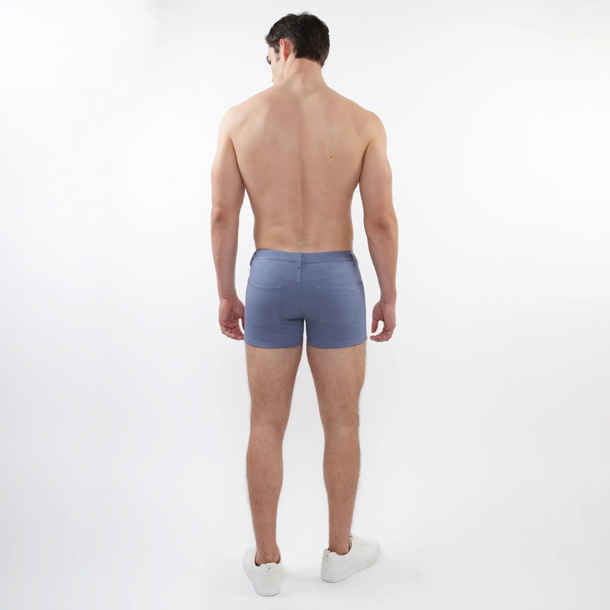 Blue denim 3 inch stretch knit shorts with classic fit and rear pockets showing the back side of the product