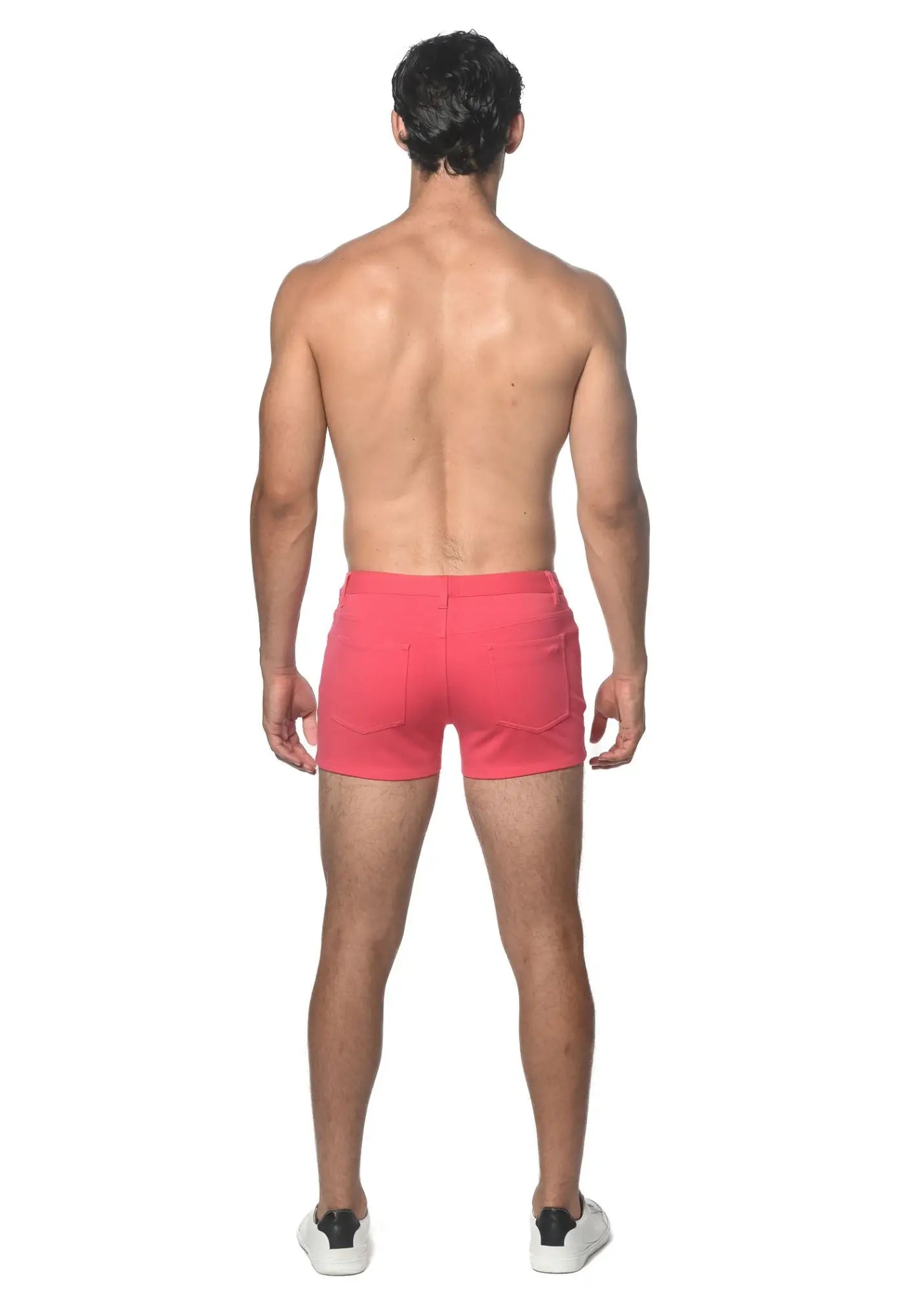 Bright pink 3 inch stretch knit shorts with a modern design and subtle side pockets for athletic wear