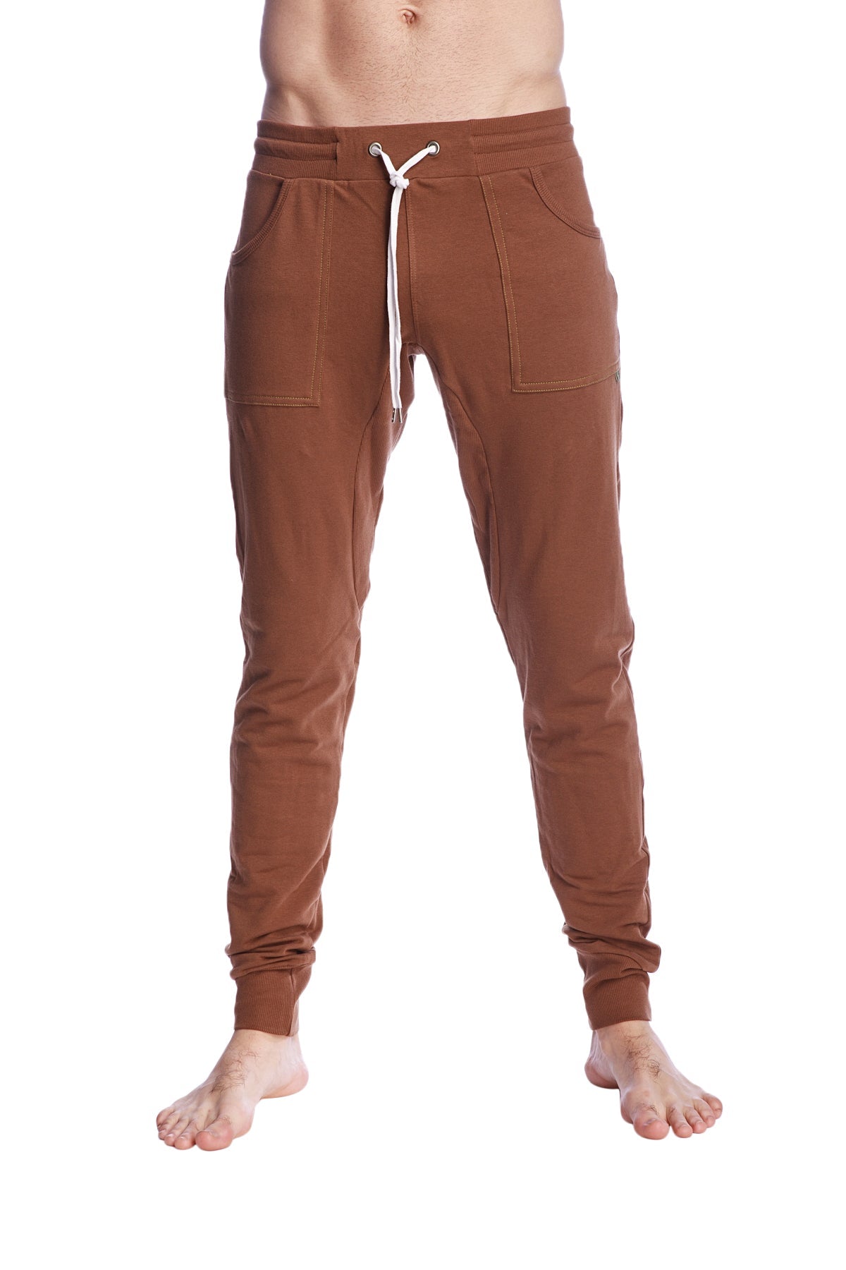 Brown long cuffed jogger and yoga sweat pants with drawstring waist and two front pockets in chocolate brown