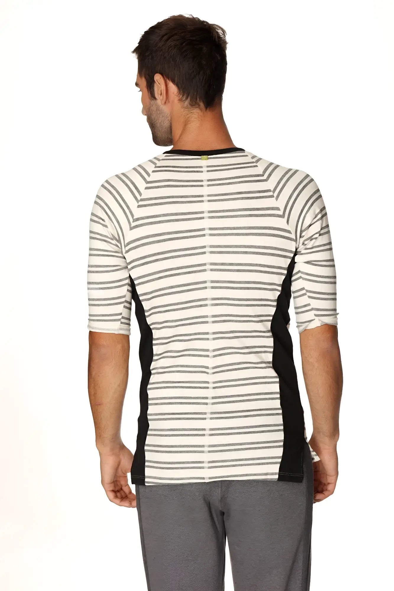 A men’s short-sleeved athletic henley tee with white gray stripes and black side panels in french terry loop fabric